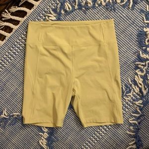 Girlfriend High Rise Bike Shirts in Pear